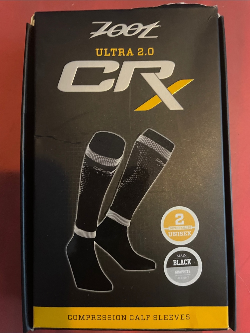 New In Box Zoot Ultra 2.0 CRX Compression Calf Sleeves — Black with Gray Accents